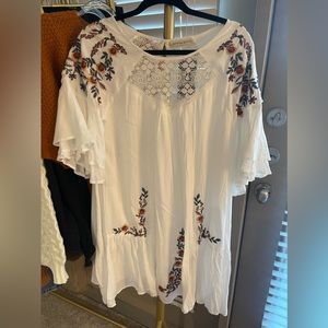 Fully lined white embroidered swing dress